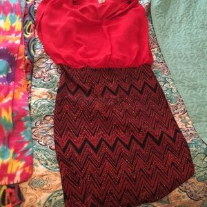 A red and black chevron print that is form fitting